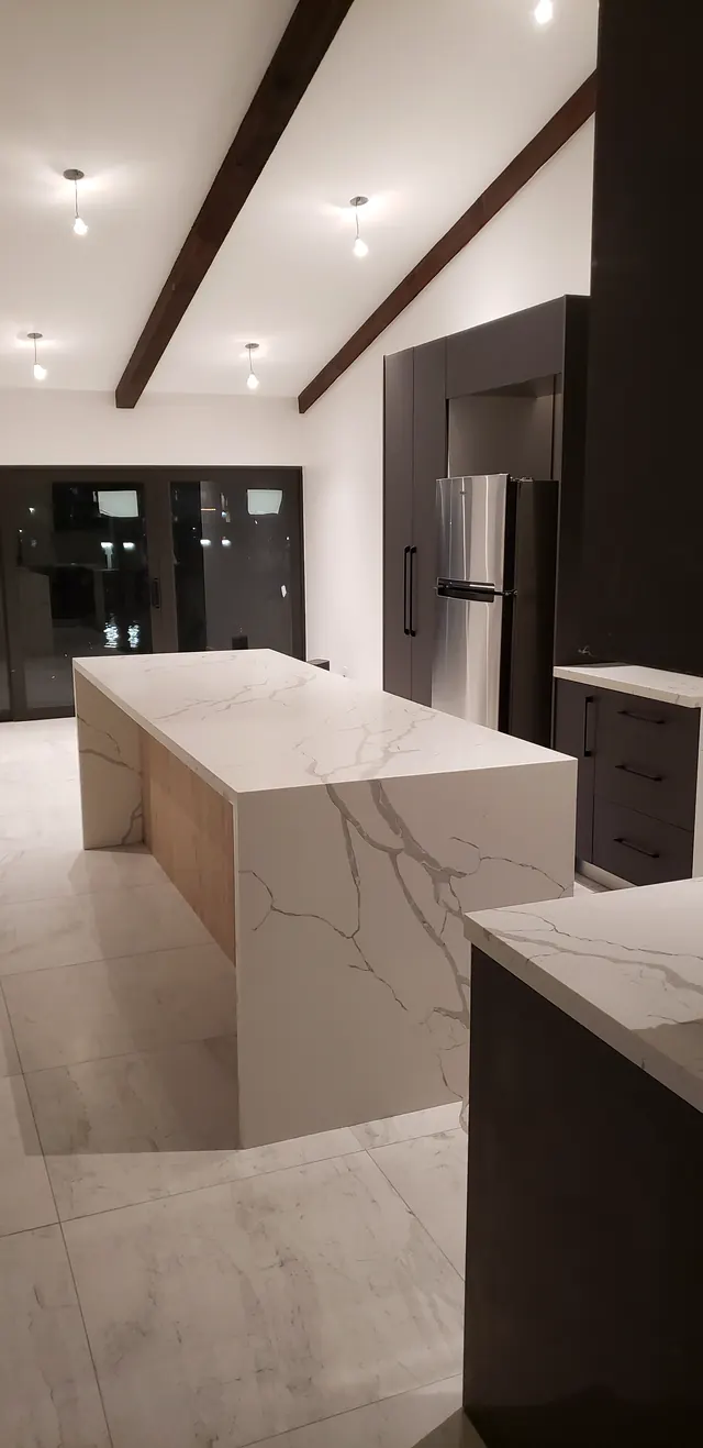 Contemporary flat-panel kitchen with island seating