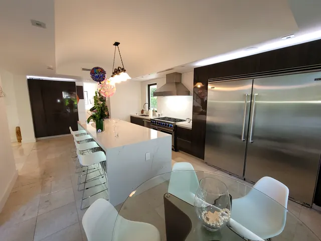 Dark wood luxury kitchen with Viking appliances, Miami
